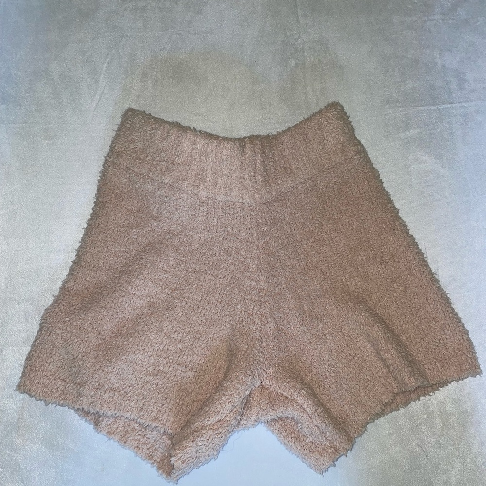 pink SKIMS fuzzy shorts